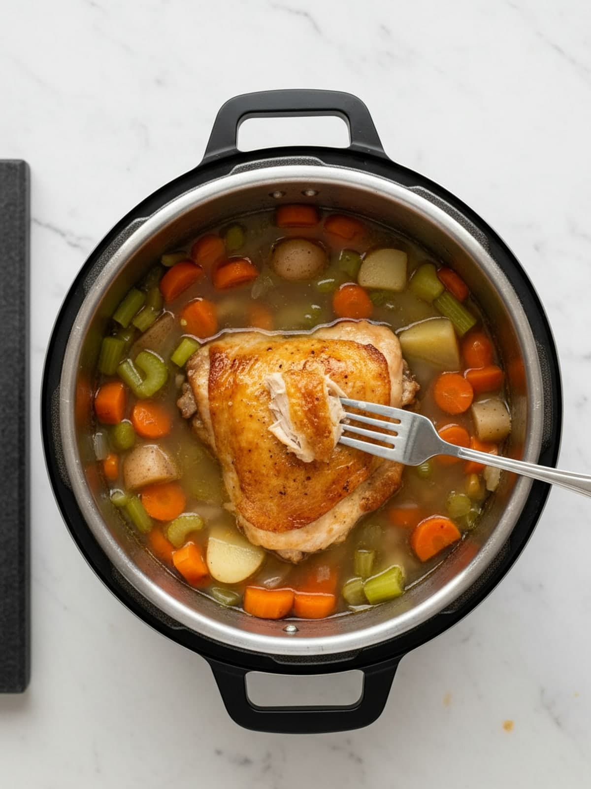 Instant Pot Chicken Noodle Soup: Cook noodles in the open pot