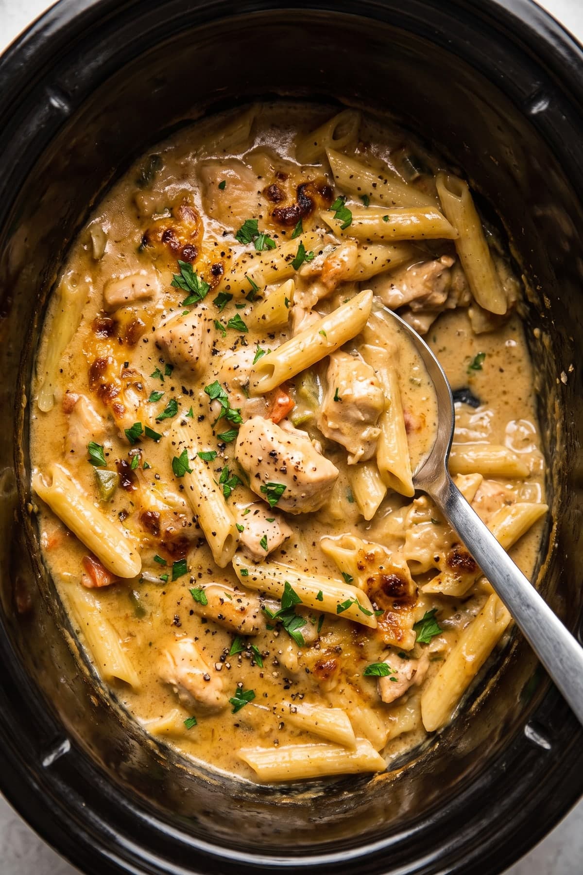 Slow Cooker Creamy Chicken Penne ready to serve